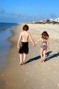 Kids walking on beach