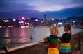 Kids watch Hong Kong harbor skyline