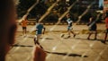 Kids Watching from Behind the Fence How Young Neighborhood Boys and Girls Play Soccer in Backyard Royalty Free Stock Photo