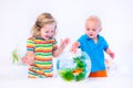 Kids watching fish bowl Royalty Free Stock Photo