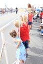 Kids watching an Independence Day parade Royalty Free Stock Photo