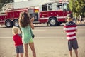 Kids watching an Independence Day Parade Royalty Free Stock Photo