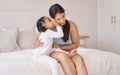 Kids whisper secret in mom ear in home bedroom for trust, love and confidential talk. Care mother listening to young Royalty Free Stock Photo