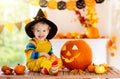 Kids in witch costume on Halloween trick or treat Royalty Free Stock Photo