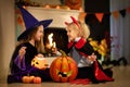 Kids in witch costume on Halloween trick or treat Royalty Free Stock Photo