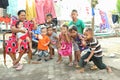 Kids with woman posing in Manado