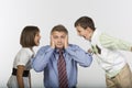 Kids yell into ears of dad Royalty Free Stock Photo