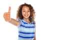 Kids, youve got my vote. Studio shot of a young girl giving a thumbs up against a white background. Royalty Free Stock Photo