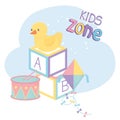 Kids zone, alphabet blocks duck kite and drum toys Royalty Free Stock Photo