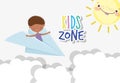 Kids zone, cute little boy playing in the paper plane sky sun Royalty Free Stock Photo