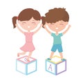 Kids zone, cute little girl and boy playing with alphabet blocks toys Royalty Free Stock Photo