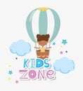 Kids zone, cute little girl flying in hot air balloon Royalty Free Stock Photo