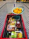 Kiel, Germany - 30 December 2023: View into a shopping cart in a German supermarket with many products