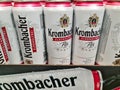 Kiel, Germany - 02. February 2024: Krombacher brand beer cans on a supermarket shelf