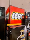 Kiel, Germany - 11. February 2023: Lego Logo inbetween boxes of toys