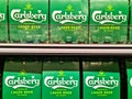 Kiel, Germany - 02. February 2024: Packs of Carlsberg beer on a supermarket shelf