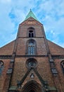 Kiel, Germany - 04. May 2024: Beautiful view of the old Saint Nicolai church in Kiel with the old walls