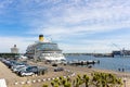 Kiel, Germany - May 19, 2023: Scenic view Costa Firenze cruise liner ship docked car tourist bus parking Oslo quay Kiel