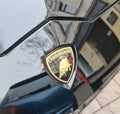 Kiel, Germany - 27. September 2023: Lamborghini logo on a black sports car