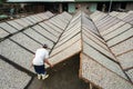 Kien Giang, Vietnam - Dec 6, 2016: Yellowstripe scad fish is drying outdoor under sunlight in Mekong Delta, south of Vietnam