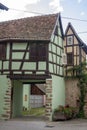 French traditional half-timbered houses in Kientzheim village in Alsace, France Royalty Free Stock Photo