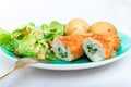 Kiev cutlet with jacket potatoes and salad Royalty Free Stock Photo