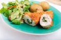 Kiev cutlet with jacket potatoes and salad Royalty Free Stock Photo