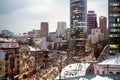 Kiev downtown in snow and highway hard car traffic in winter evening, Ukraine. Old and modern high-rise buildings, business center Royalty Free Stock Photo