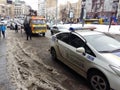 Kiev, March 6, 2018, Ukraine. Traffic police officers on street to pick up intruder`s car on tow truck. Loading tow truck car of Royalty Free Stock Photo