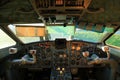 Aviation and aircraft. The cockpit of an old Soviet Yak-40 plane in the rays of the evening