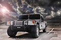 Kiev. September 9, 2016; Hummer H1 against the backdrop of a thunderstorm Royalty Free Stock Photo