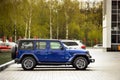 Kiev, Ukraine - April 21, 2020: Blue SUV Jeep Sahara in the city. Side view