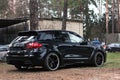 Kiev, Ukraine - 11 April; Porsche Cayenne Turbo TechArt Magnum on background kombine Royalty Free Stock Photo