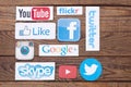 KIEV, UKRAINE - AUGUST 22, 2015:Collection of popular social media logos printed on paper:Facebook, Twitter, Google Plus