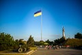 Kiev, Ukraine August 23, 2020: The famous Motherland Monument and the flagpole with the largest flag of Ukraine Royalty Free Stock Photo