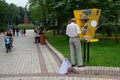 Kiev, Ukraine - August 18, 2018: Man chooses a book in a street library