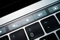 Kiev, Ukraine - August 9,2022: Power off, volume down and volume up buttons on touch bar apple macbook pro close up. Additional Royalty Free Stock Photo