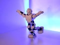 Small cyborg robots, humanoids with face and body dances to music