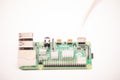 Kiev, UkraClose-up of a powered Raspberry Pi 4 Model-B on a white background. The RPI4b is a credit-card- Royalty Free Stock Photo