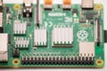 Kiev, Ukraine - August 13th, 2020: Single-board computer Raspberry Pi 4 with cooling radiators glued to the processor and