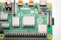 Kiev, Ukraine - August 13th, 2020: Small single-board Raspberry Pi 4 computer on white background. Top view