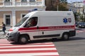 Kiev, Ukraine - August 21, 2018: White ambulance quickly drives along a wide street