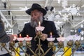 02.09.2019 Kiev, Ukraine. the chief rabbi of the city of Kiev lights candles with children at the festival of Hanukkah