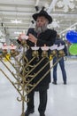 02.09.2019 Kiev, Ukraine. the chief rabbi of the city of Kiev lights candles with children at the festival of Hanukkah