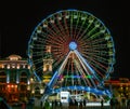 Kiev, Ukraine - 19 Dec 2019: Giant ferris wheel in night at the Contract Square