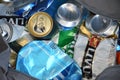 KIEV, UKRAINE - DECEMBER 22, 2021: Crumpled beer cans for scrap