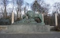 A sculpture of a lion and a lioness at the entrance to the Kiev Zoo.
