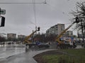 KIEV, UKRAINE - DECEMBER 28, 2019: Repair of wires installation of cameras on city poles