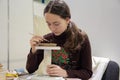 Kiev, Ukraine - February 11, 2019: Girl at a master class on making ceramic tableware