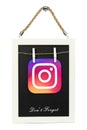 Instagram icon placed on wooden frame Royalty Free Stock Photo